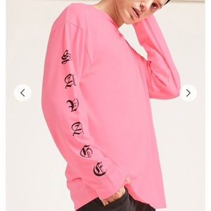 Light pink long sleeve shirt with sleeve design